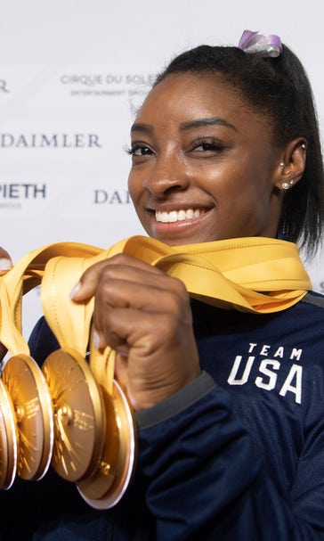 After record world medal haul, Biles a face of 2020 Olympics